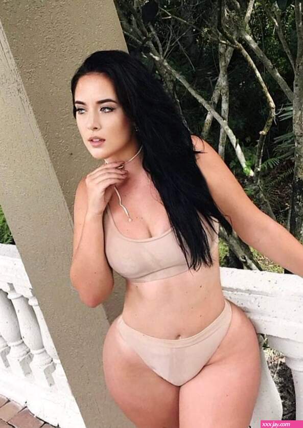 hot brunette pawg posing in swimwear