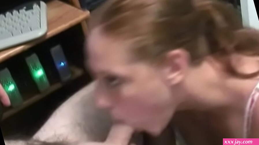 Gorgeous cute redhead gives a hot blowjob to geek on chair