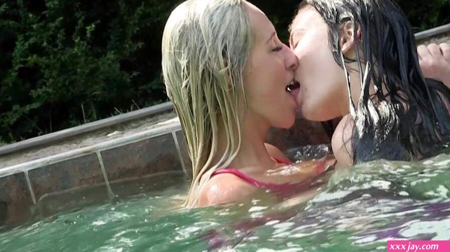 Blonde And Brunette Lesbians Have Sex By The Pool