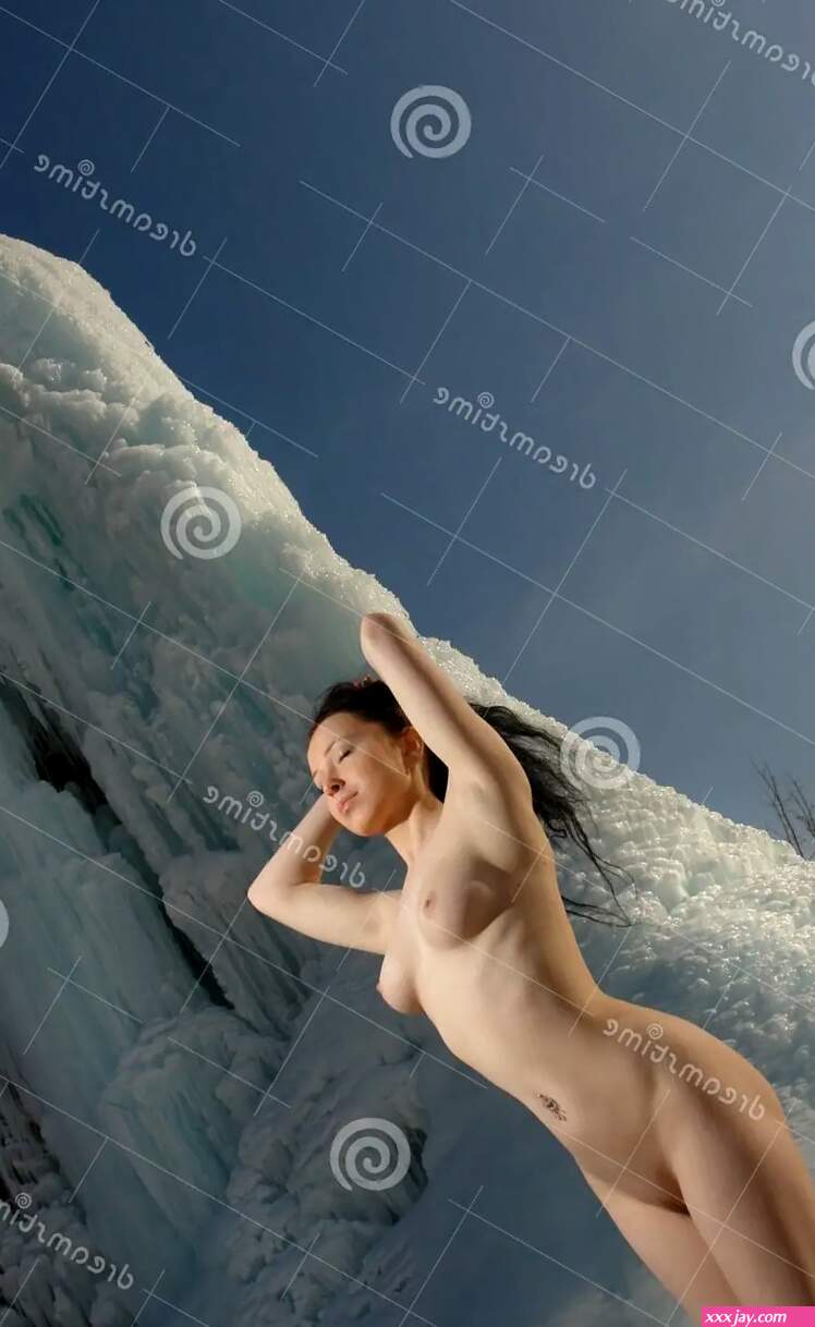 Naked girl on a glacier stock image. Image of happiness