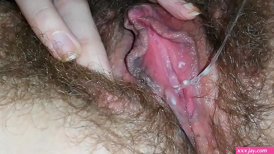 Dirty hairy pussy with big clit masturbates and cums dripping wet close up