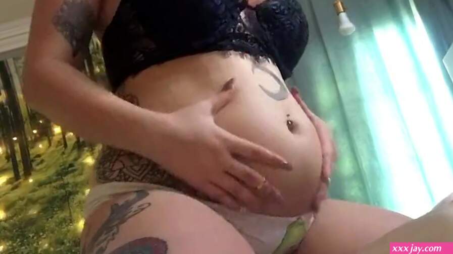Petite teen feedee shows off belly and ass