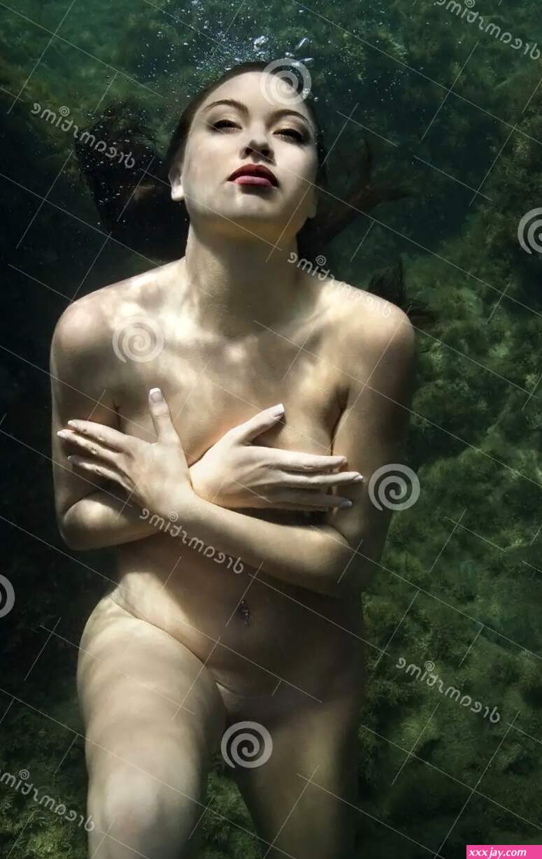 Nude woman underwater. stock photo. Image of cover bubbles